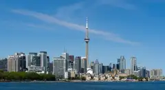 The Toronto skyline with the CN Tower, seen from Trillium Park across the water